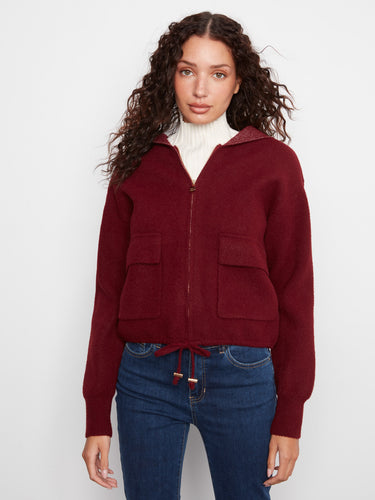 This jacket features a chic short length, perfect for layering over your favorite outfits by Charlie B.