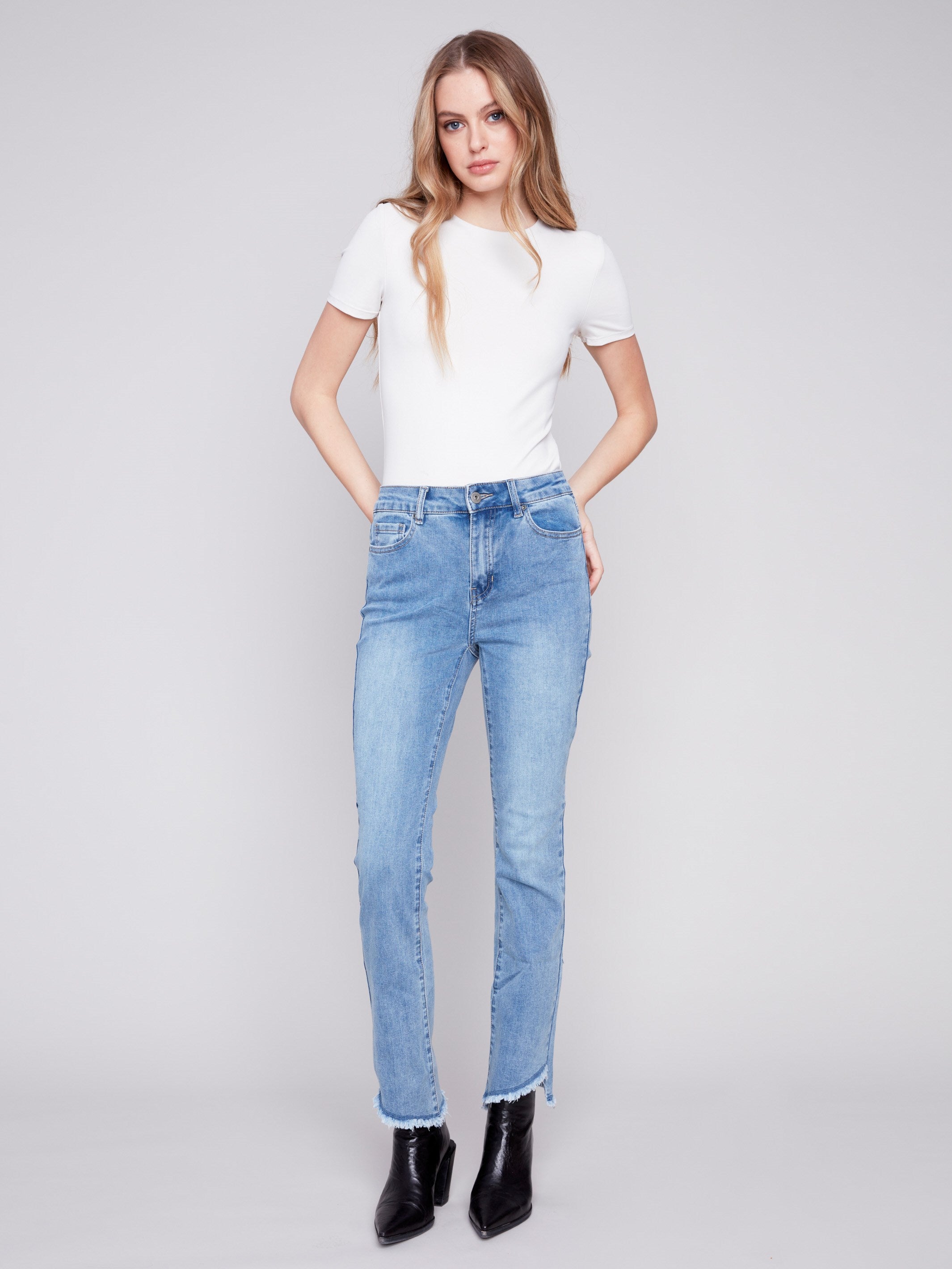 Charlie B Bootcut Jeans with Asymmetrical Hem - Light Blue - Image 1