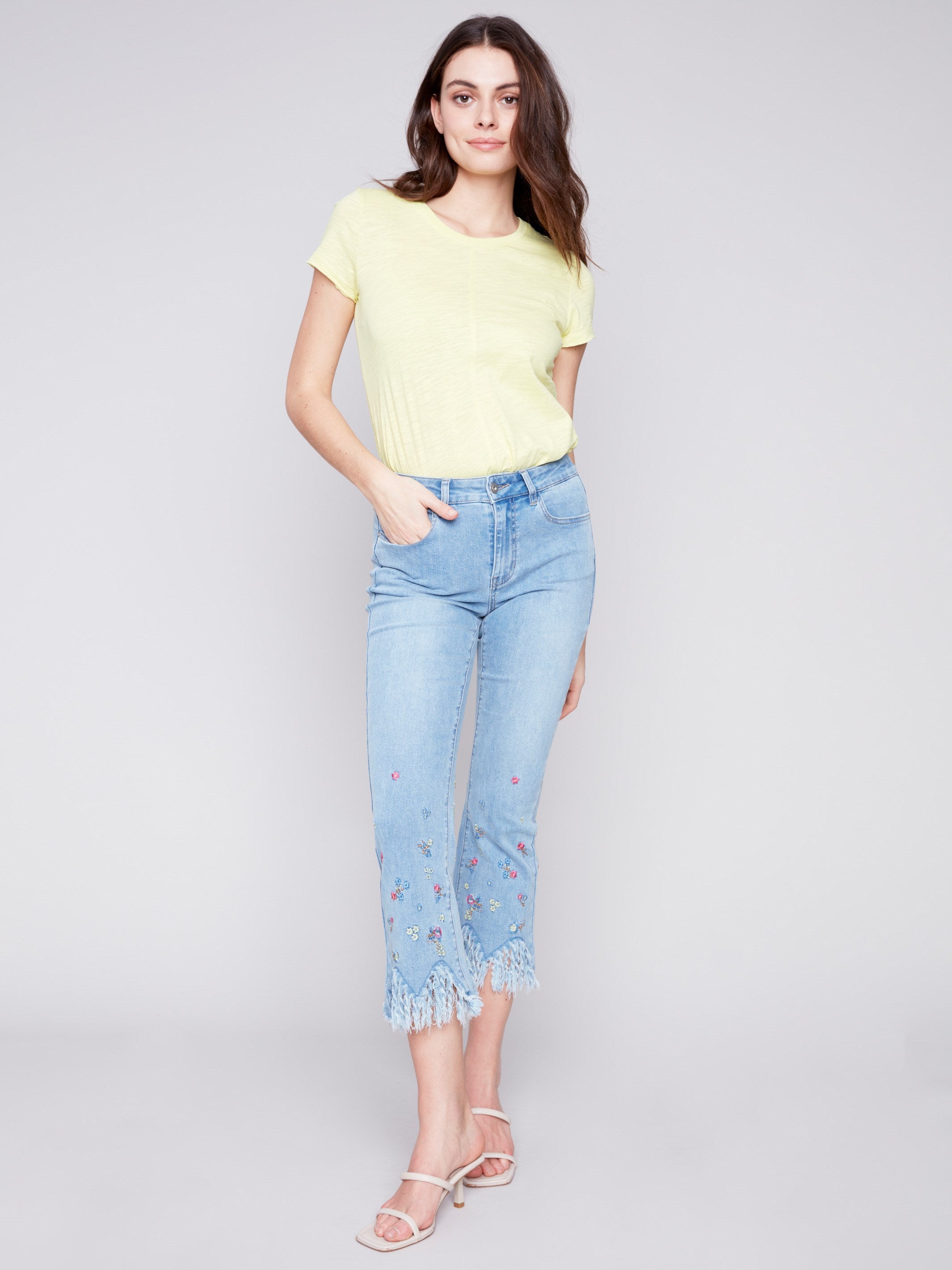 Charlie B Cropped Jeans with Embroidered Fringed Hem - Light Blue - Image 4