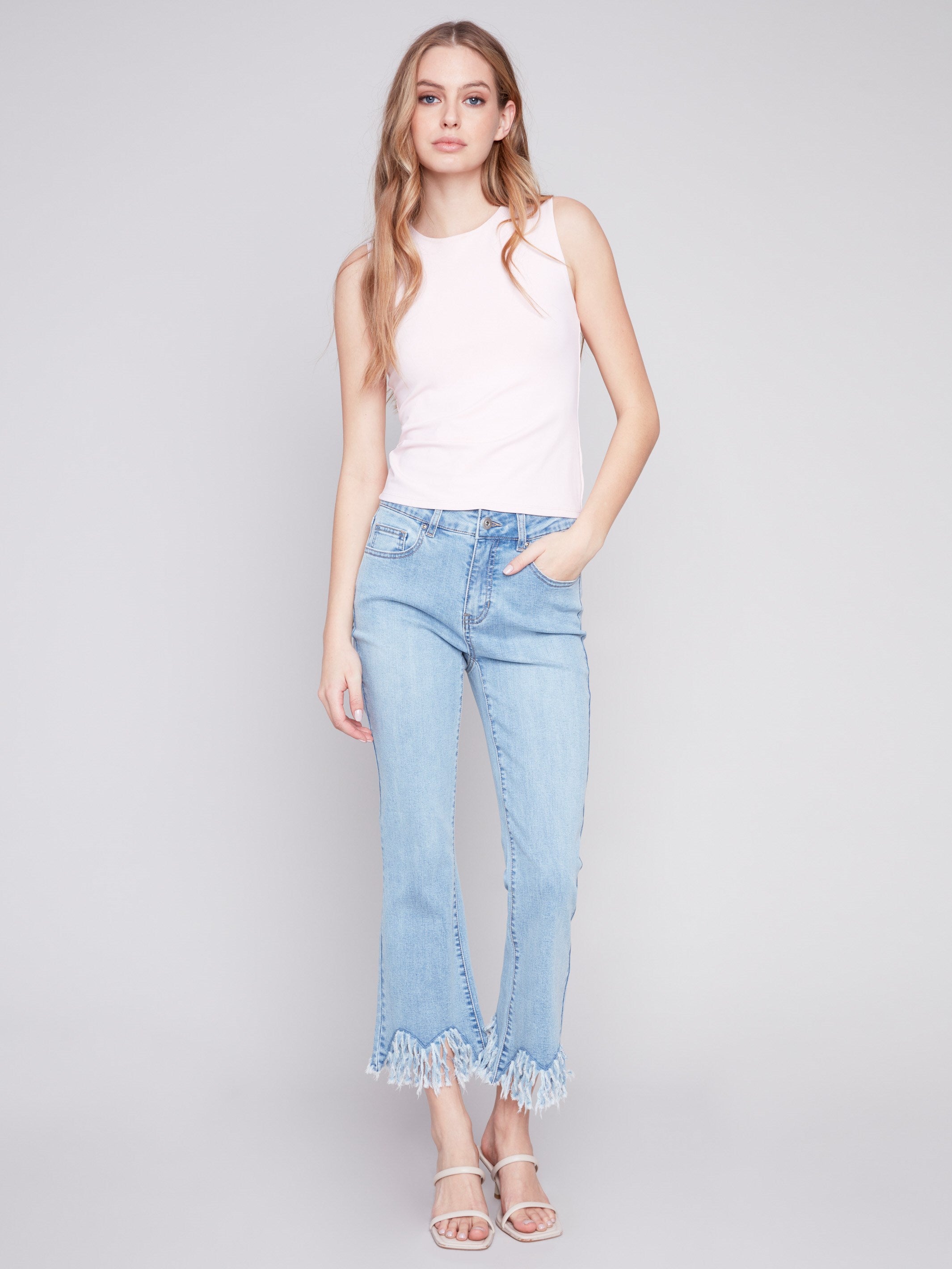 Charlie B Cropped Jeans with Fringed Hem - Light Blue - Image 1